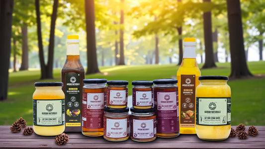 Auram Naturals raw honey, desi ghee, A2 gir cow ghee, Cooking oils and placed on the wooden table